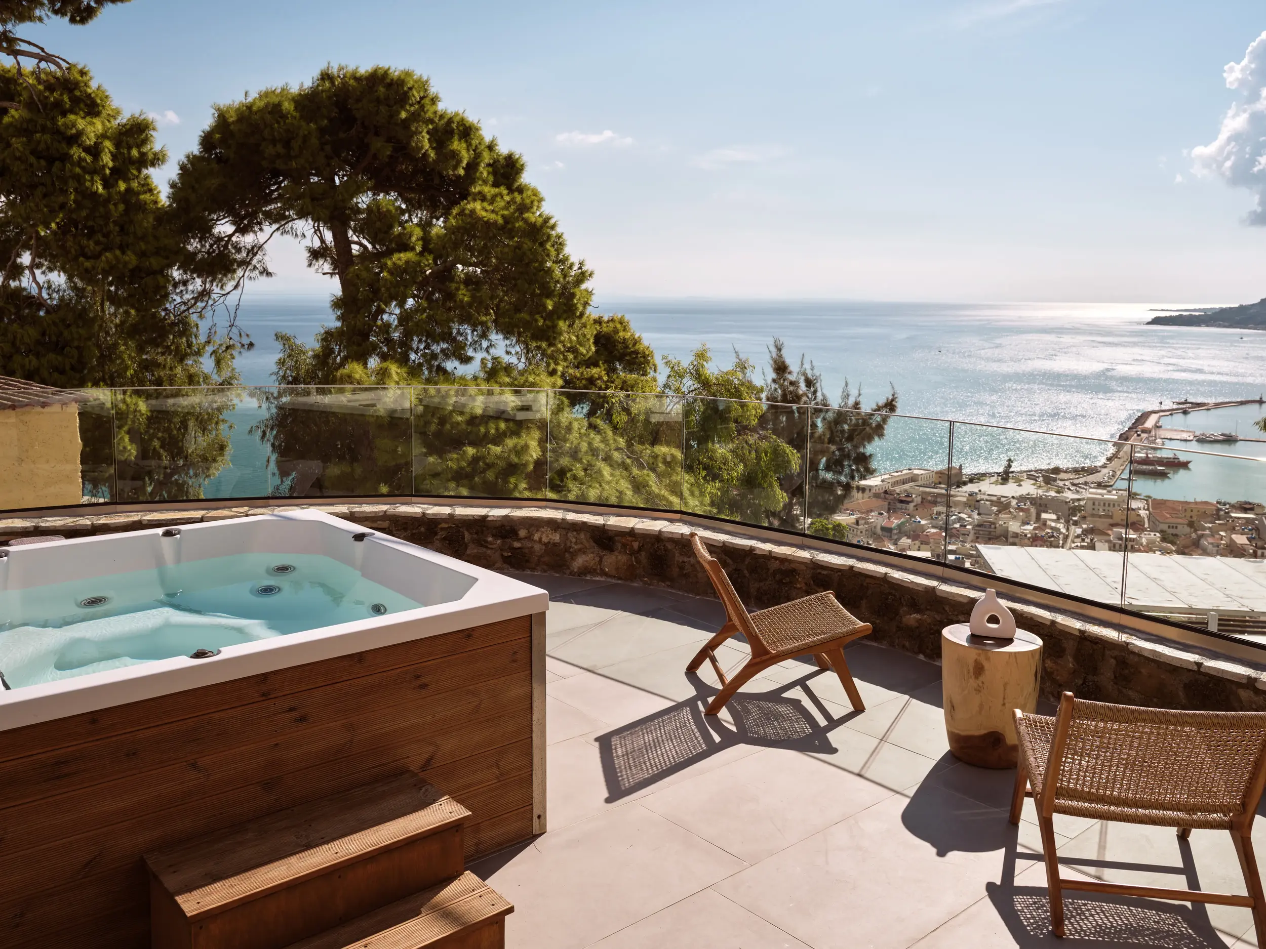Balcony Jacuzzi with clear view of the sea and city harbor